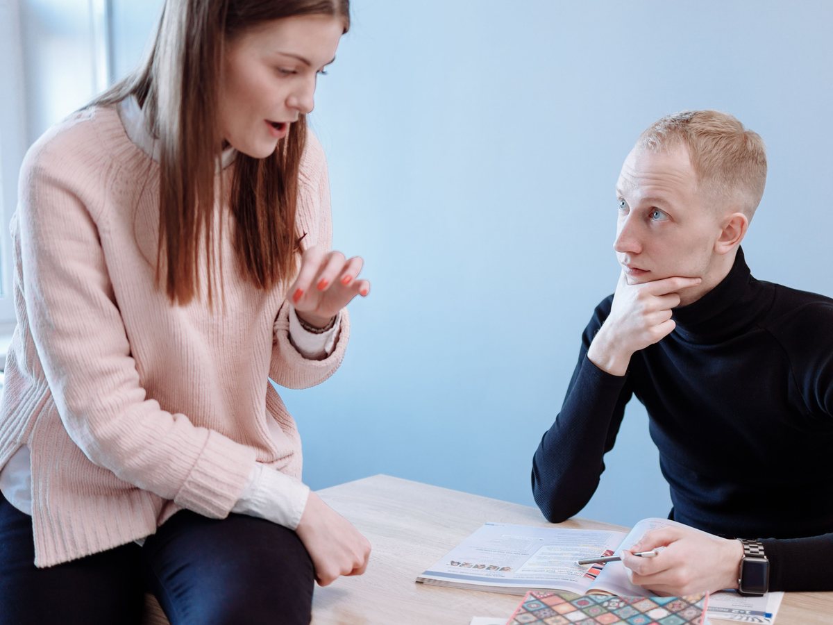 A student receiving one-to-one academic guidance