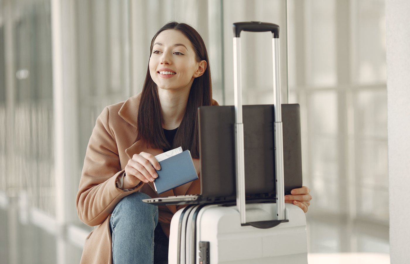 A student traveller preparing for an international journey at an airport