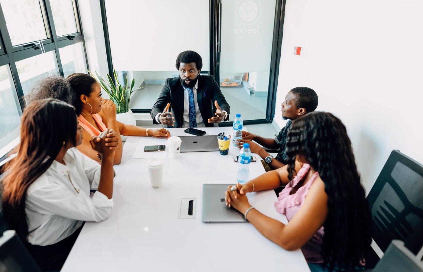 A professional African team discussing education guidance and partnerships